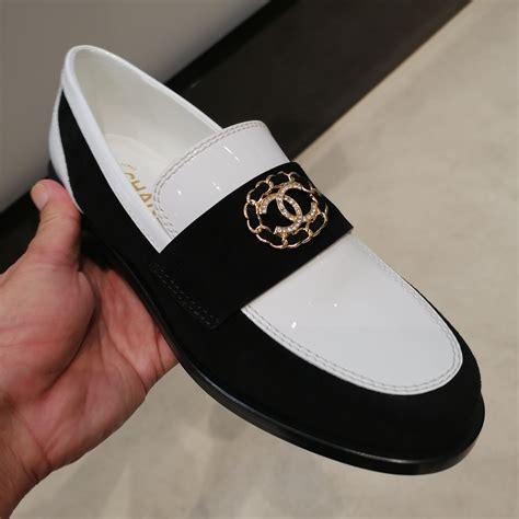 used chanel loafers|Chanel black and white loafers.